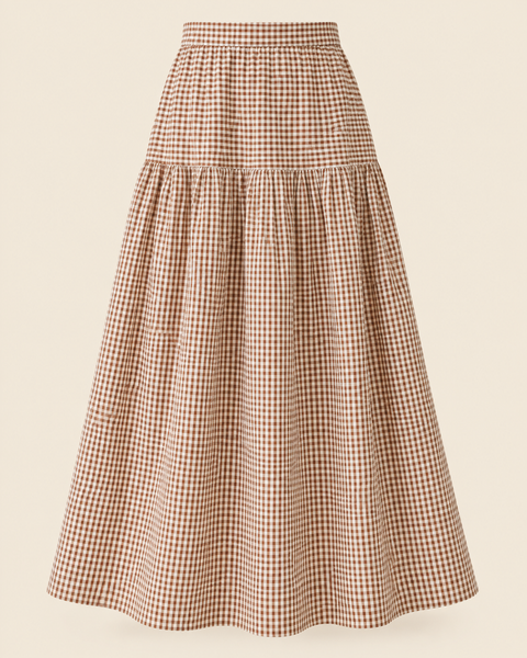 Itzi Skirt in cinnamon gingham with a high waist, smooth upper panel, gathered lower tier, and full maxi silhouette