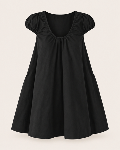 No Vacancy black micro-dot mini dress with a scoop neckline, gathered front, short puff sleeves, and relaxed swing silhouette