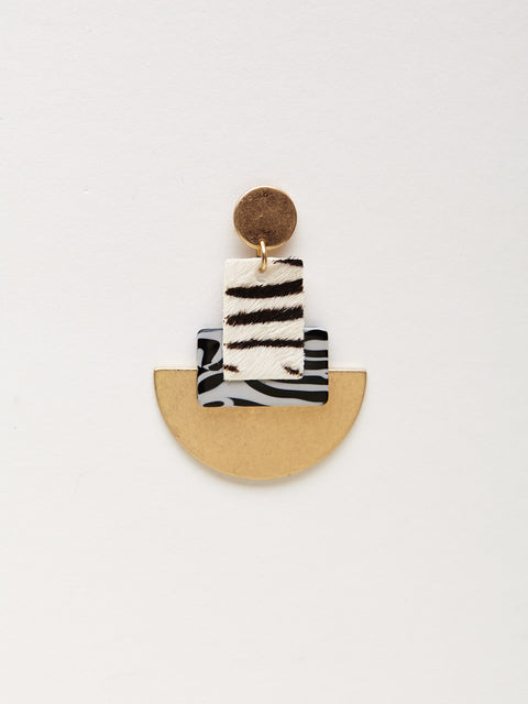 detail photo of zebra printed statement earrings